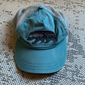 Women’s adjustable trucker  hat Patagonia bear patch logo